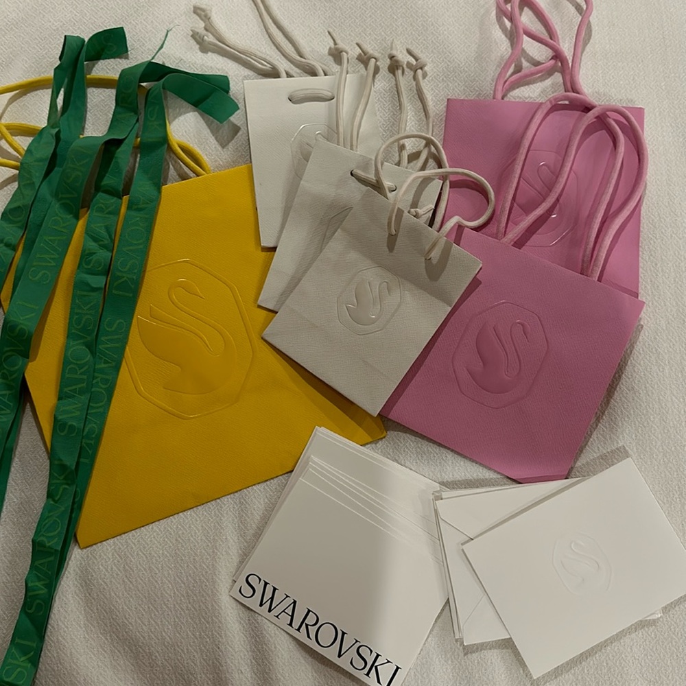 Swarovski bags, cards, envelops and ribbons 6 bags 5 ribbons, 7 cards/envelops
